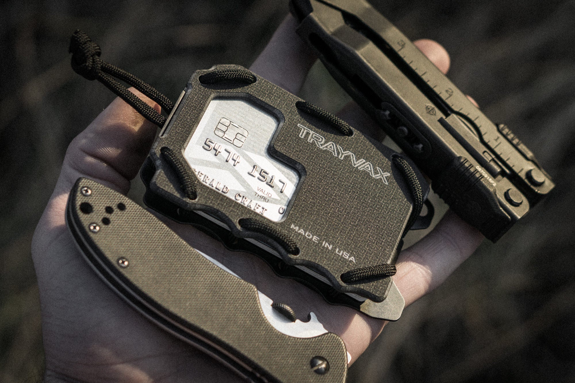 Original 2.0 Wallet Made From G10 Material in Hand with Multi-tool and Folding Knife
